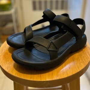 TEVA ”Hurricane Drift” runs big, very little wear. Comfortable, functional.